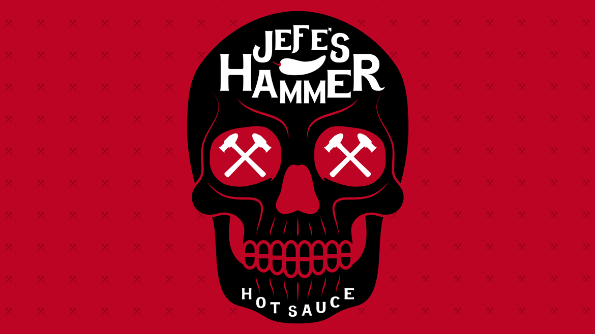 Black skull with white text and white hammers in eye sockets sitting on a red background with bespoke hammer pattern